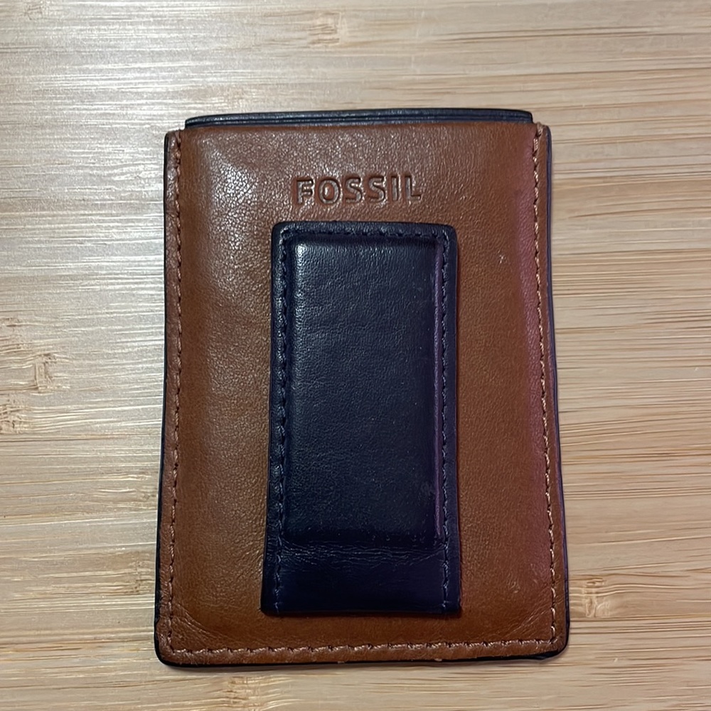 Brown and black fossil wallet with money clip